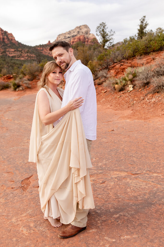 romantic Sedona elopement couple surrounded by red rock landscapes
