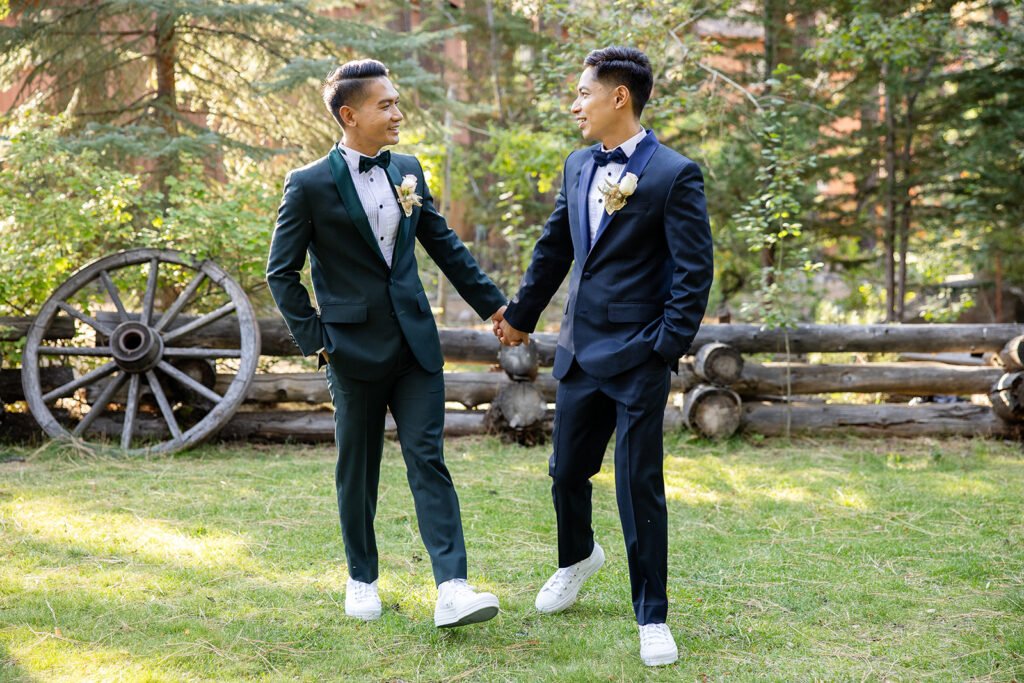 two grooms enjoying their hiking elopement day