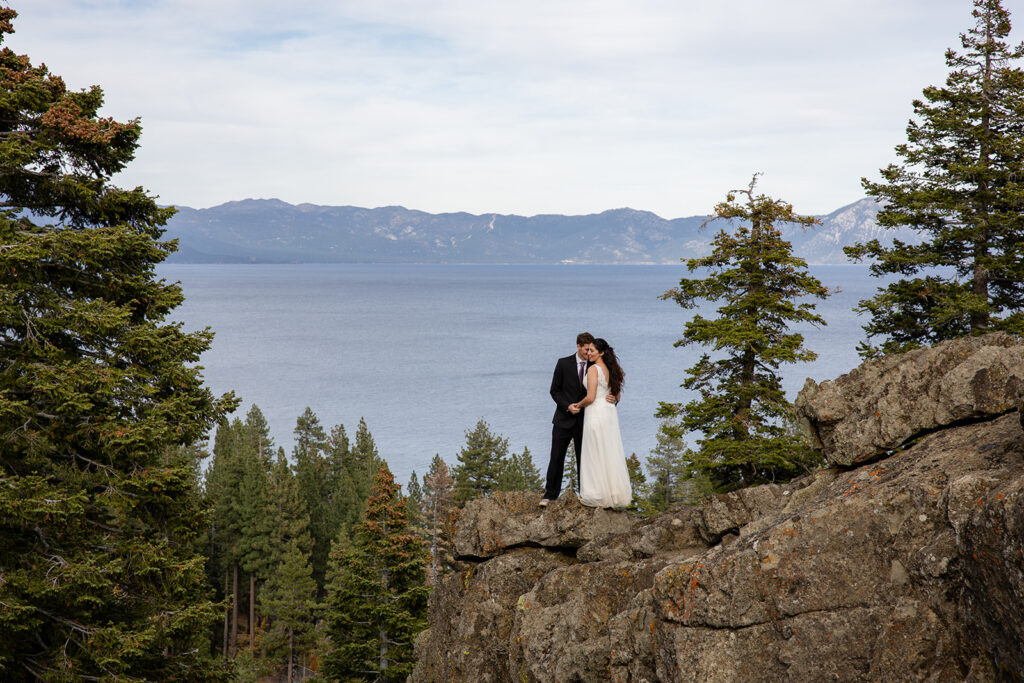 elopement couple hugging at Eagle Rock, Lake Tahoe