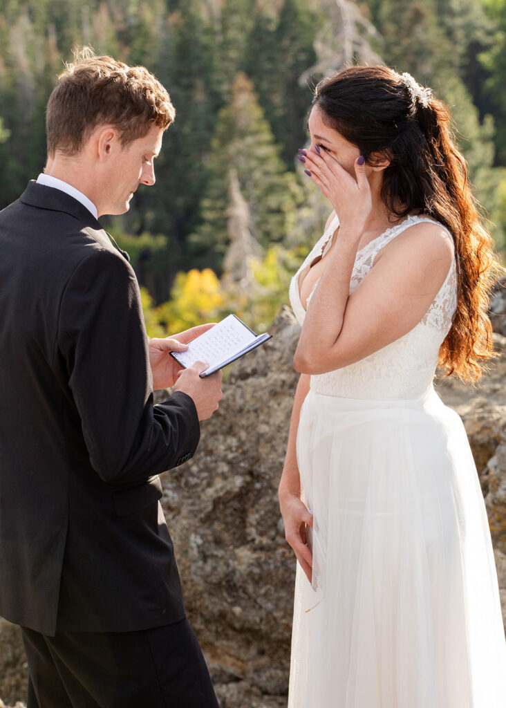 emotional and candid Eagle rock elopement ceremony with beautiful views