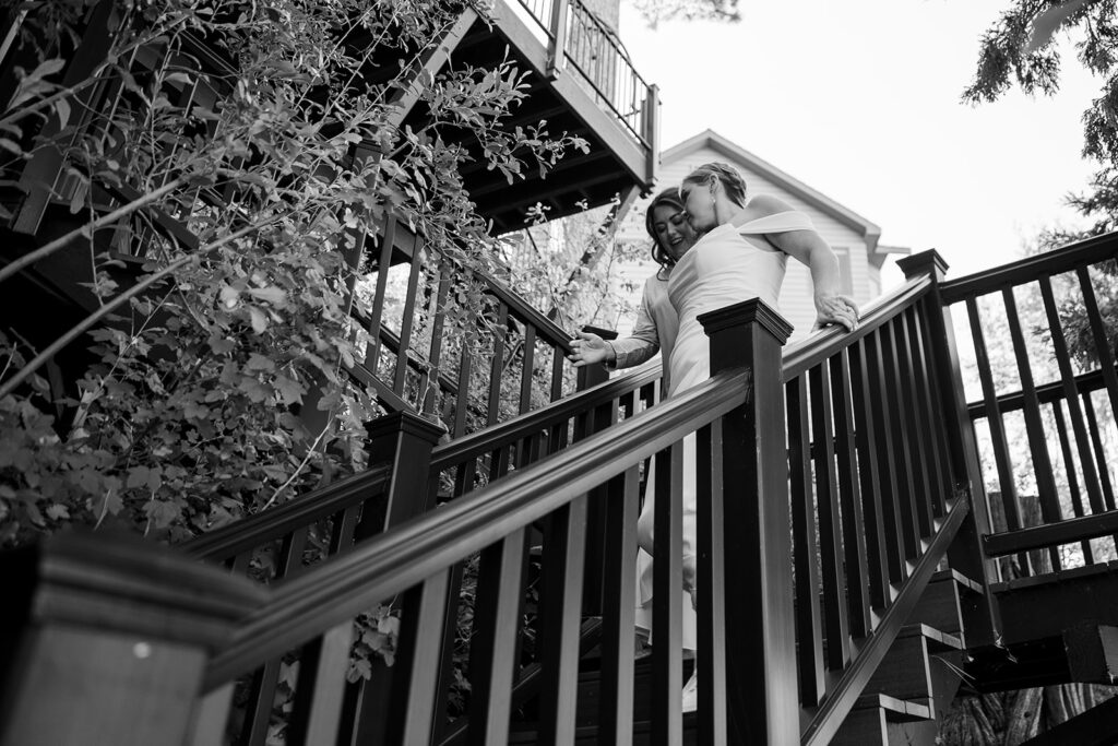 bride heading down some steps for the first look
