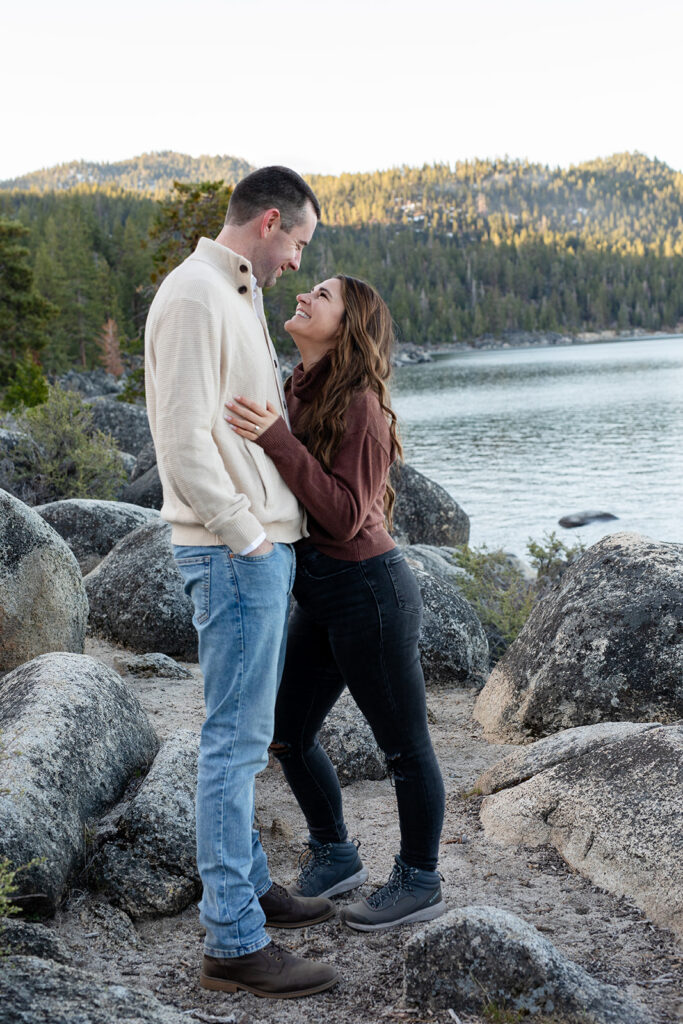 playful couple at secret cove for their lake tahoe engagement session