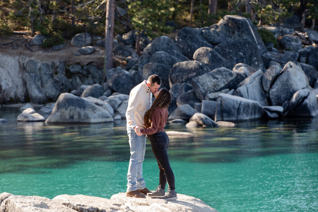 playful couple at secret cove for their lake tahoe engagement session