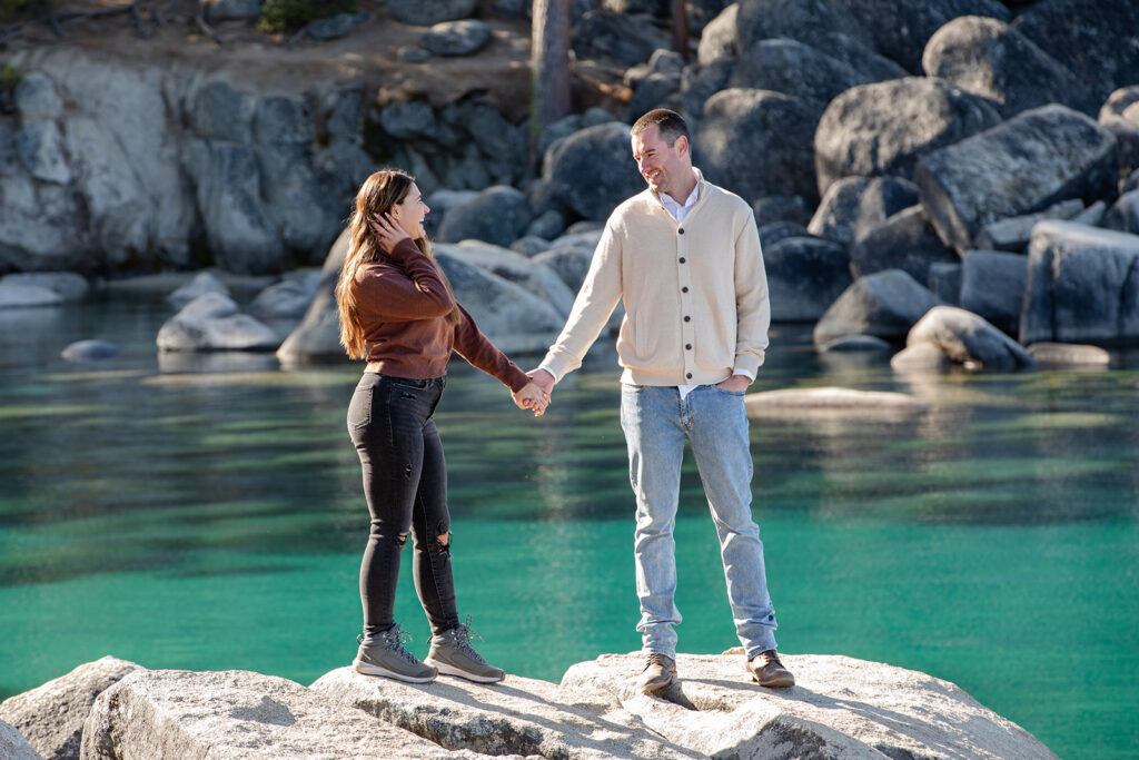 playful couple at secret cove for their lake tahoe engagement session