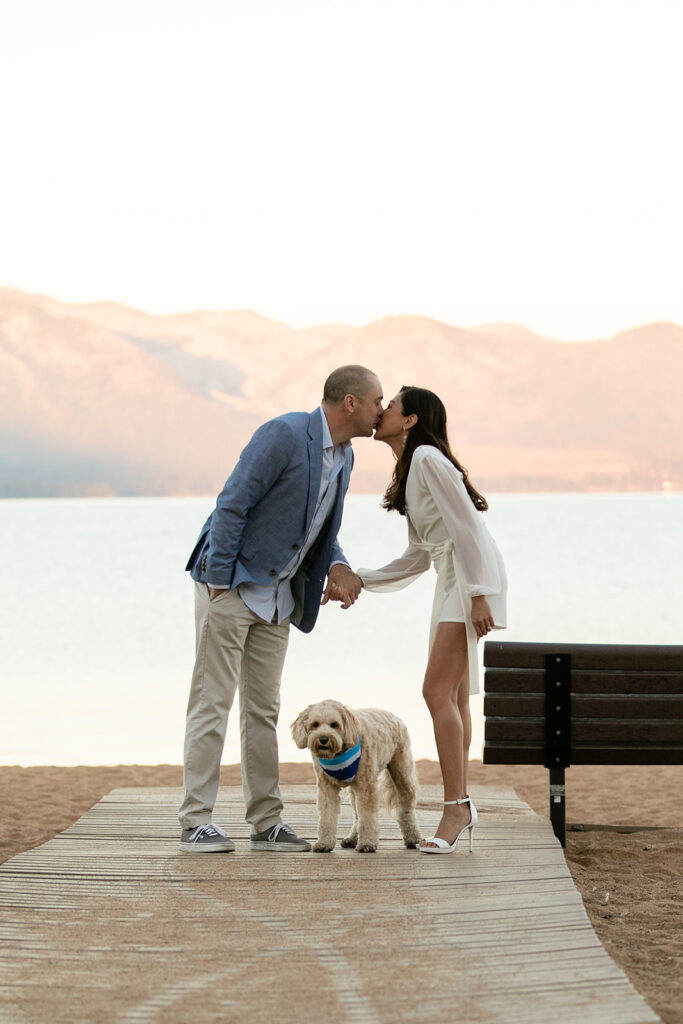 romantic golden hour engagement photos at nevada beach - couple with their cute little dog
