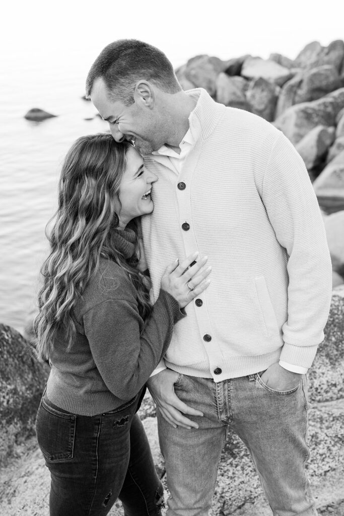 playful couple at secret cove for their lake tahoe engagement session