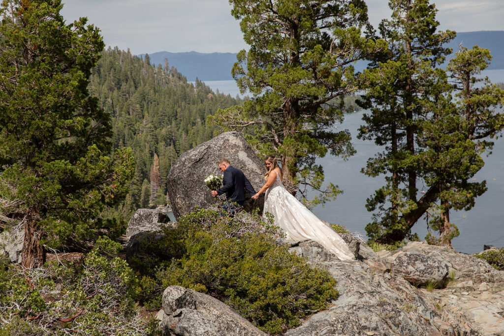 bride and groom hiking together during their lake tahoe elopement