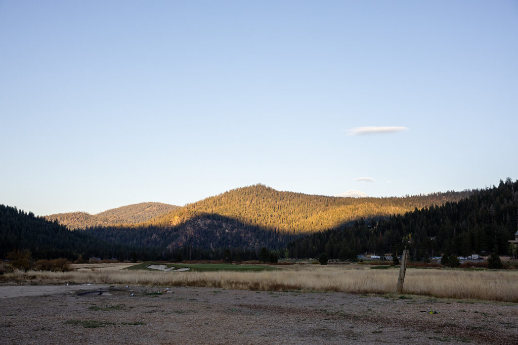 meadow and mountain views at sunset at Olympic Valley Stables, a California wedding venue