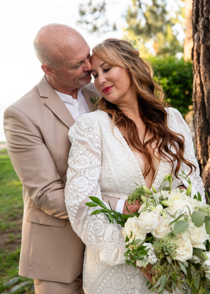 bride and groom holding each other during their Lake Tahoe elopement