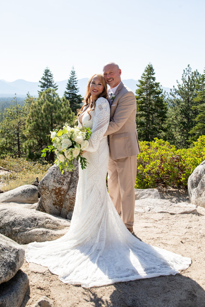 sweet bride and groom moments in Lake Tahoe with forest and mountain views in the background