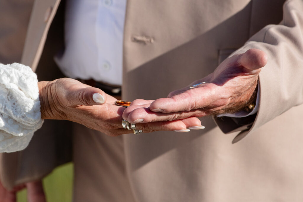 bride and groom exchanging rings