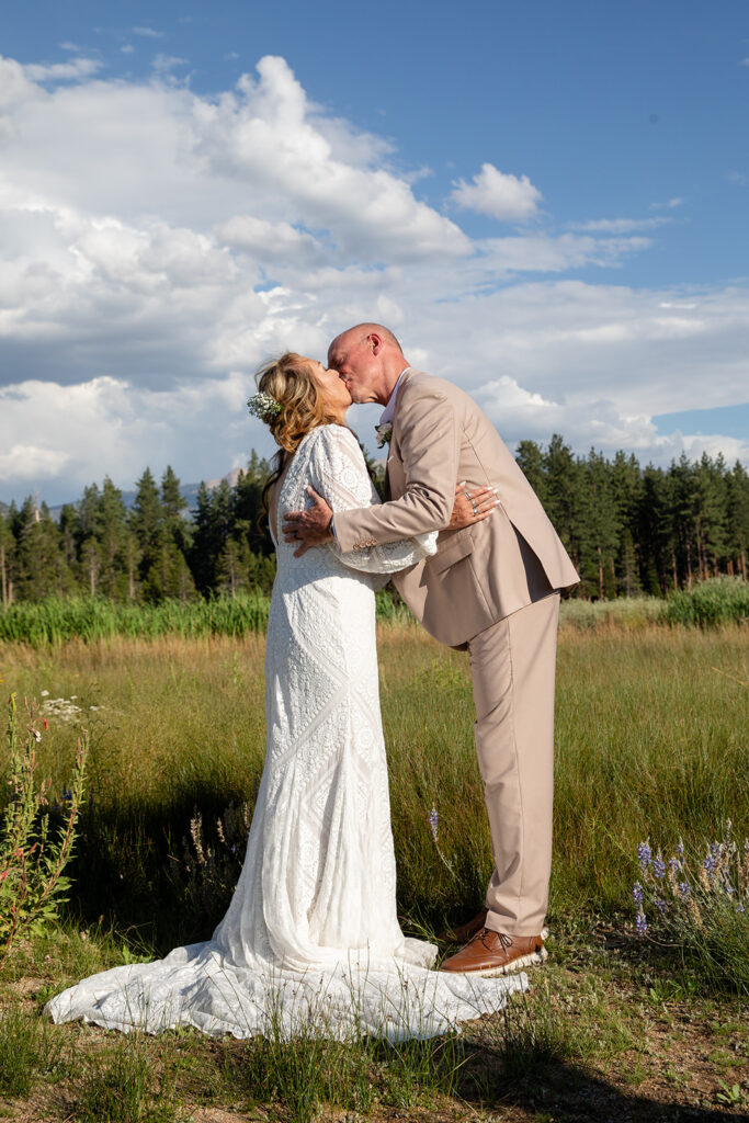 first kiss during a lake tahoe elopement ceremony at mark twain beach