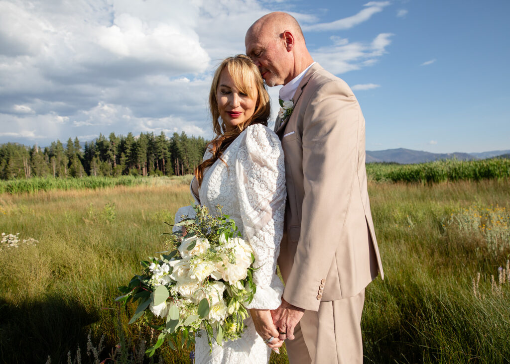 sweet elopement couple in a beautiful meadow lake tahoe elopement location
