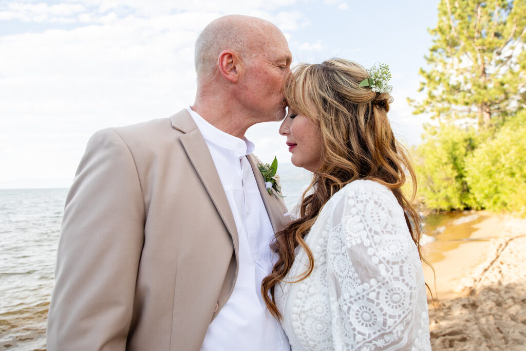 sweet and playful bride and groom at lake tahoe beach elopement locations