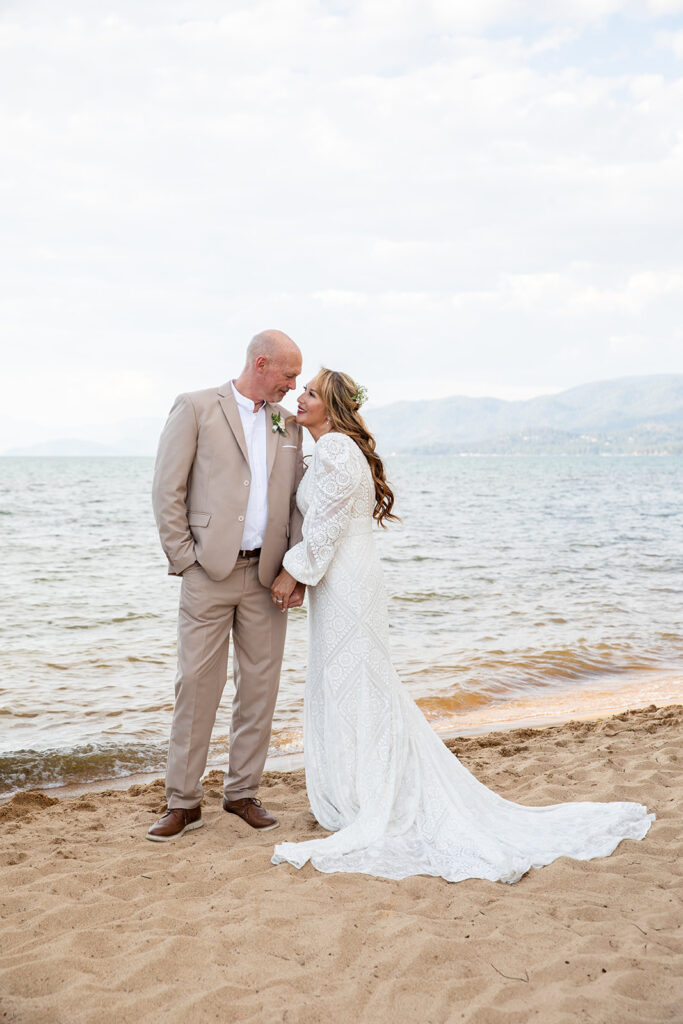 sweet and playful bride and groom at lake tahoe beach elopement locations