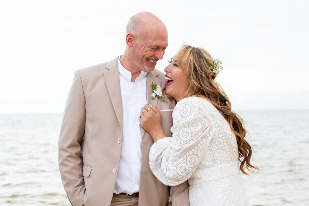 sweet and playful bride and groom at lake tahoe beach elopement locations
