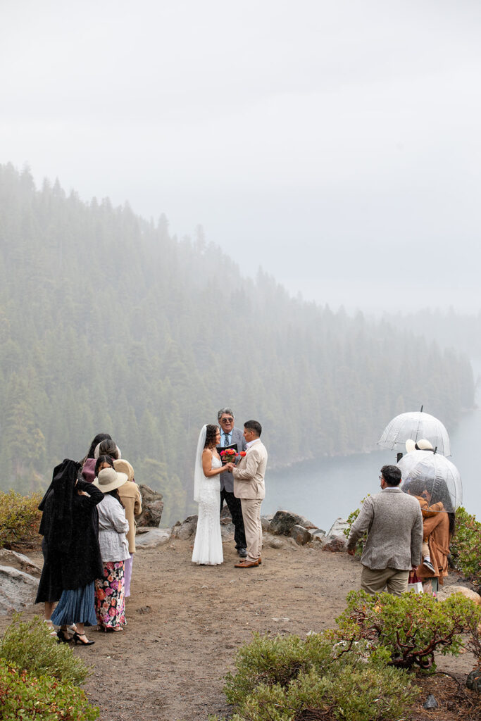 romantic rainy elopement ceremony at emerald bay, lake tahoe