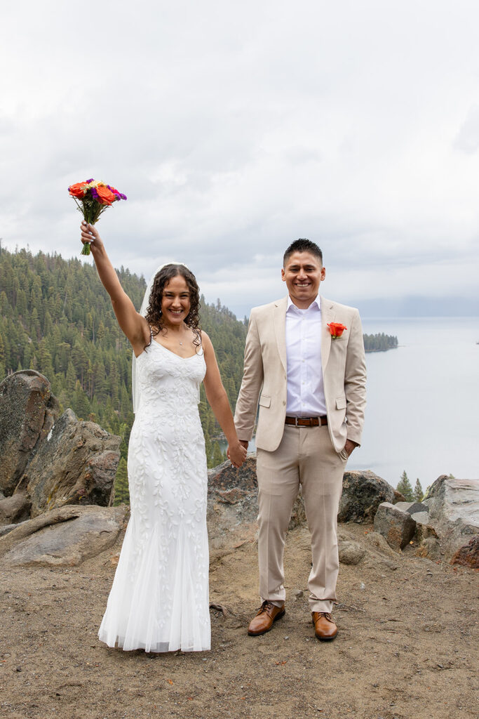 bride and groom celebrating during their emerald bay elopement