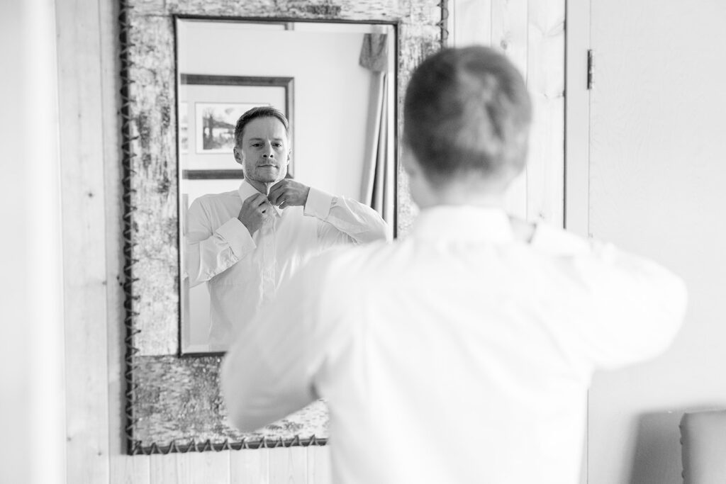 groom getting ready at the airbnb