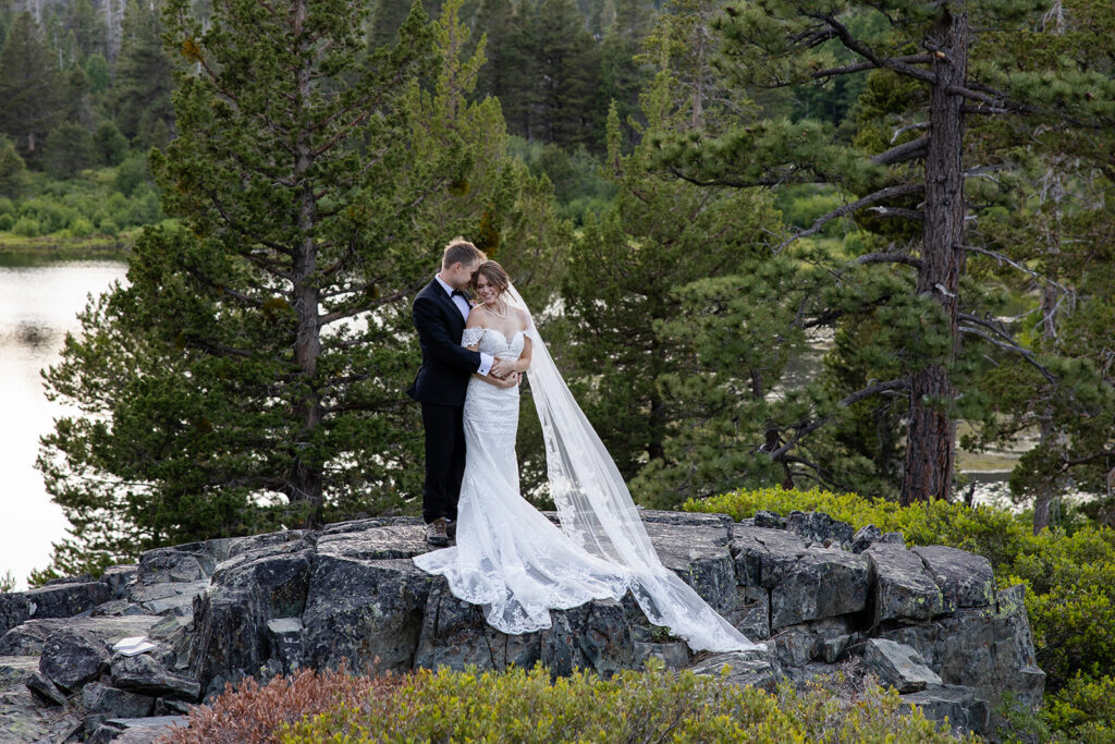 Couple standing on granite rocks at Lily Lake during their Lake Tahoe elopement