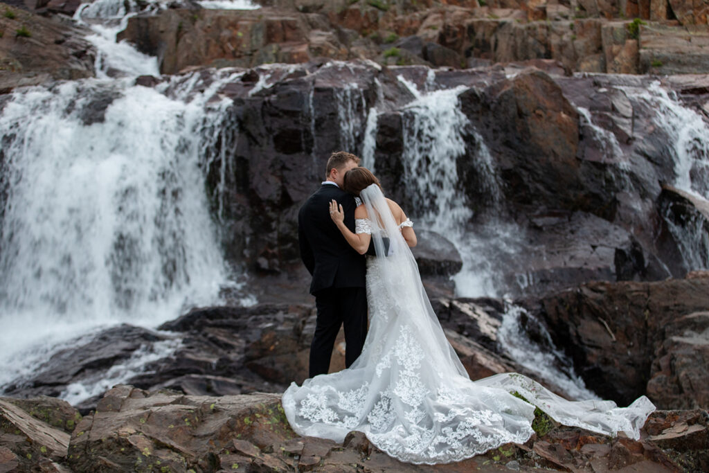 Waterfall backdrop at Glen Alpine Falls during Tahoe wedding photo session