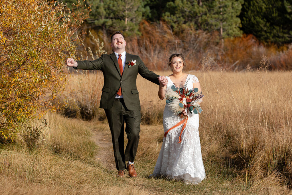 excited bride and groom walking off the ceremony