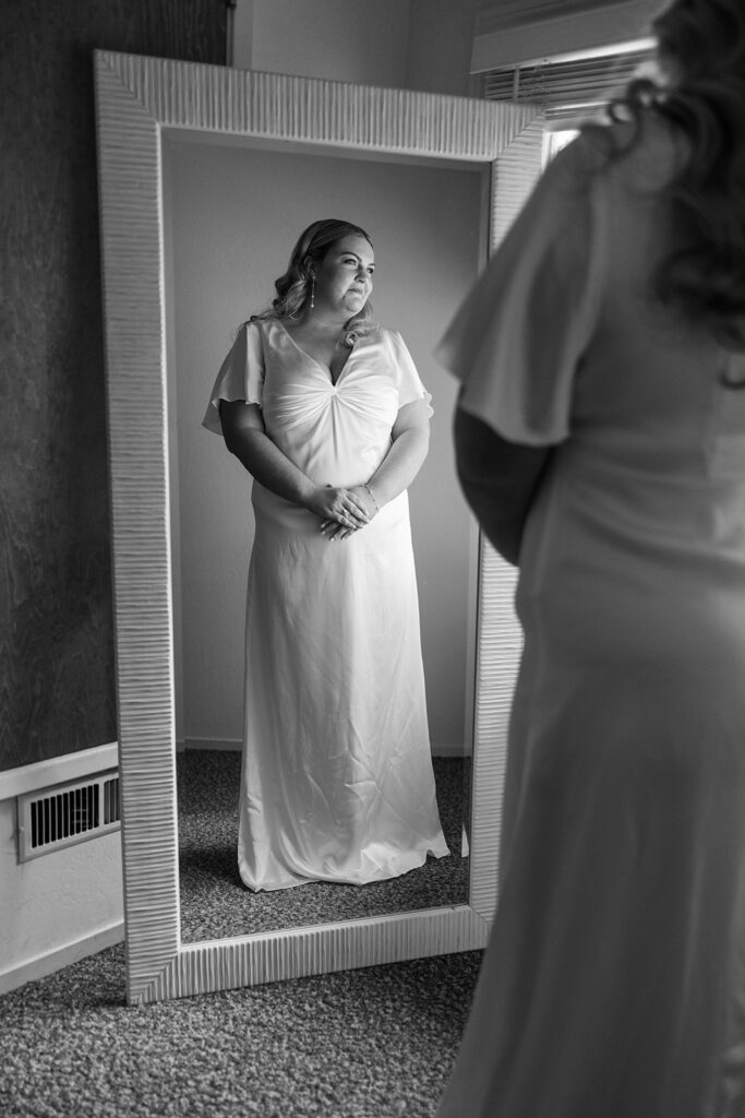 bride looking at the mirror 