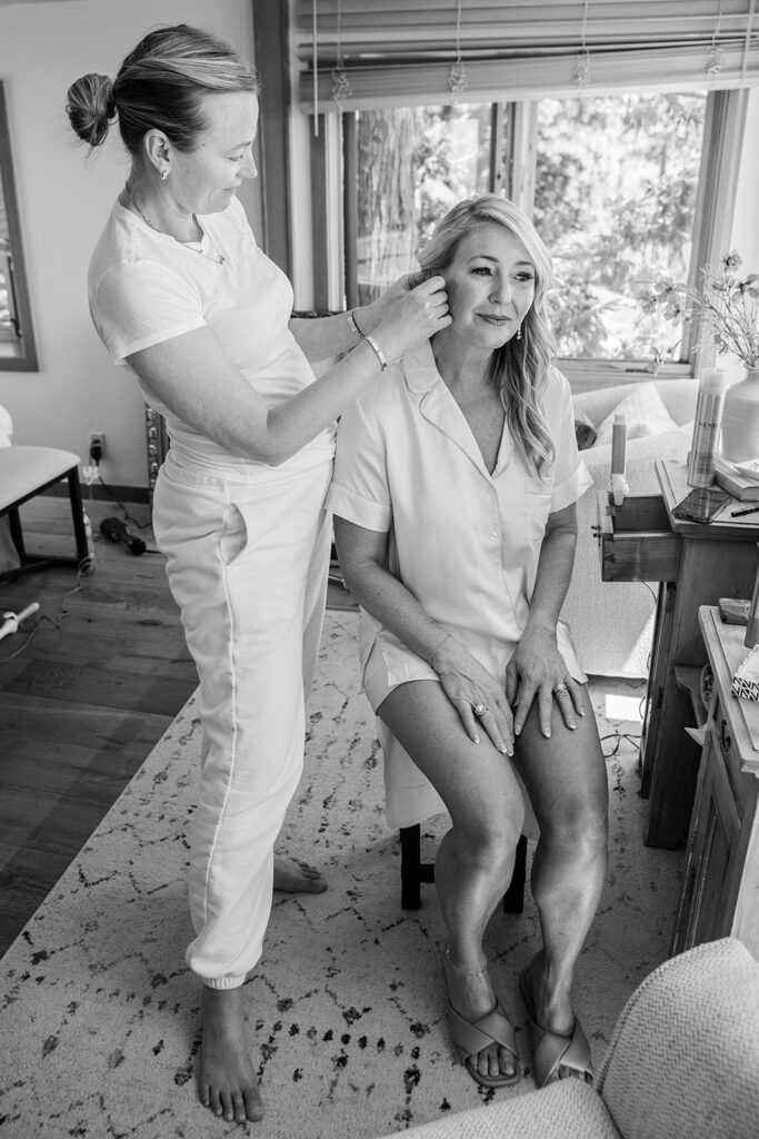 bride getting her hair and make up done ahead of the elopement