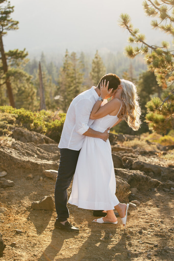 playful golden hour mountain engagement photos at Eagle Rock, Lake Tahoe
