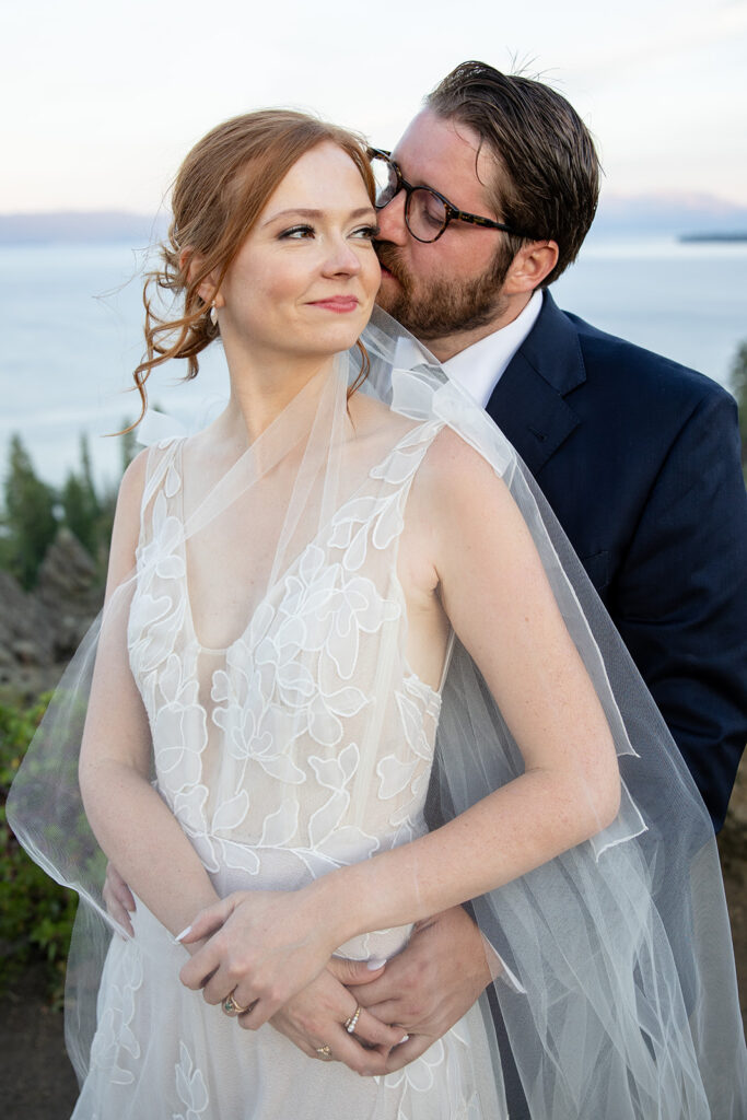 adventure elopement couple on a mountain cliff in lake tahoe