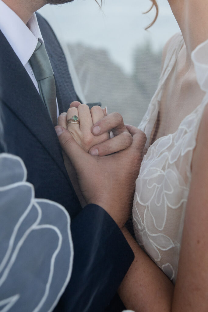 adventure elopement couple on a mountain cliff in lake tahoe