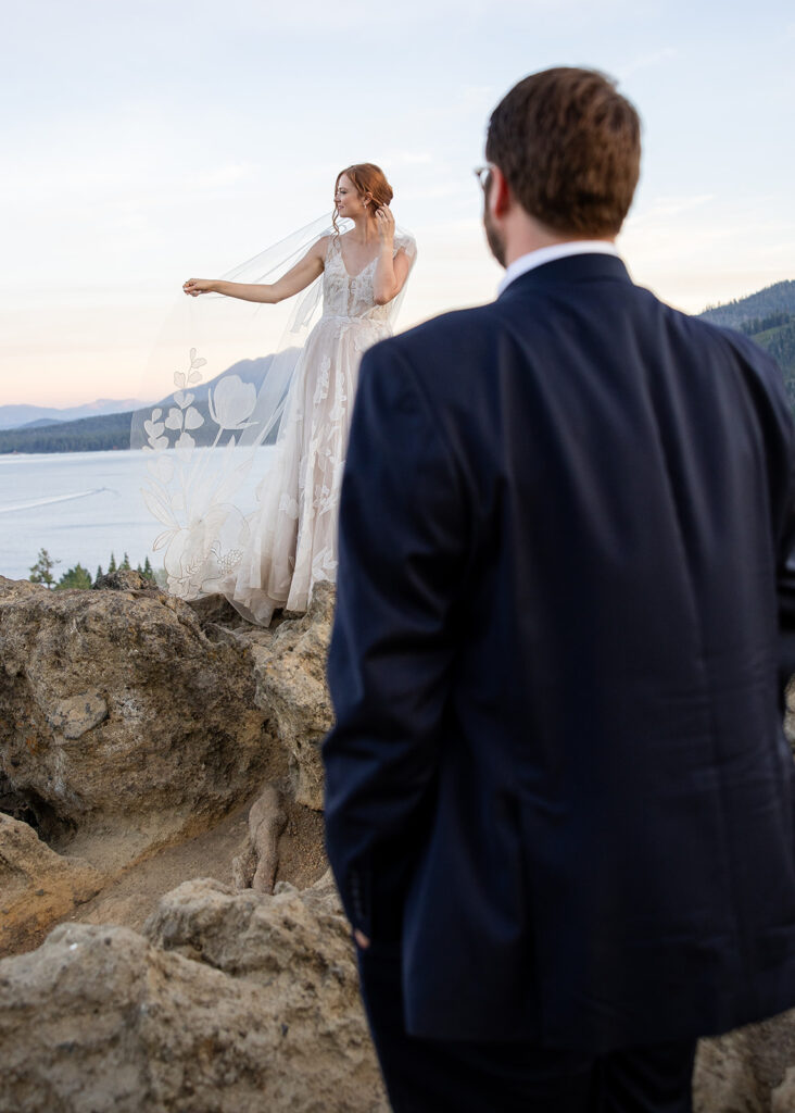 adventure elopement couple on a mountain cliff in lake tahoe