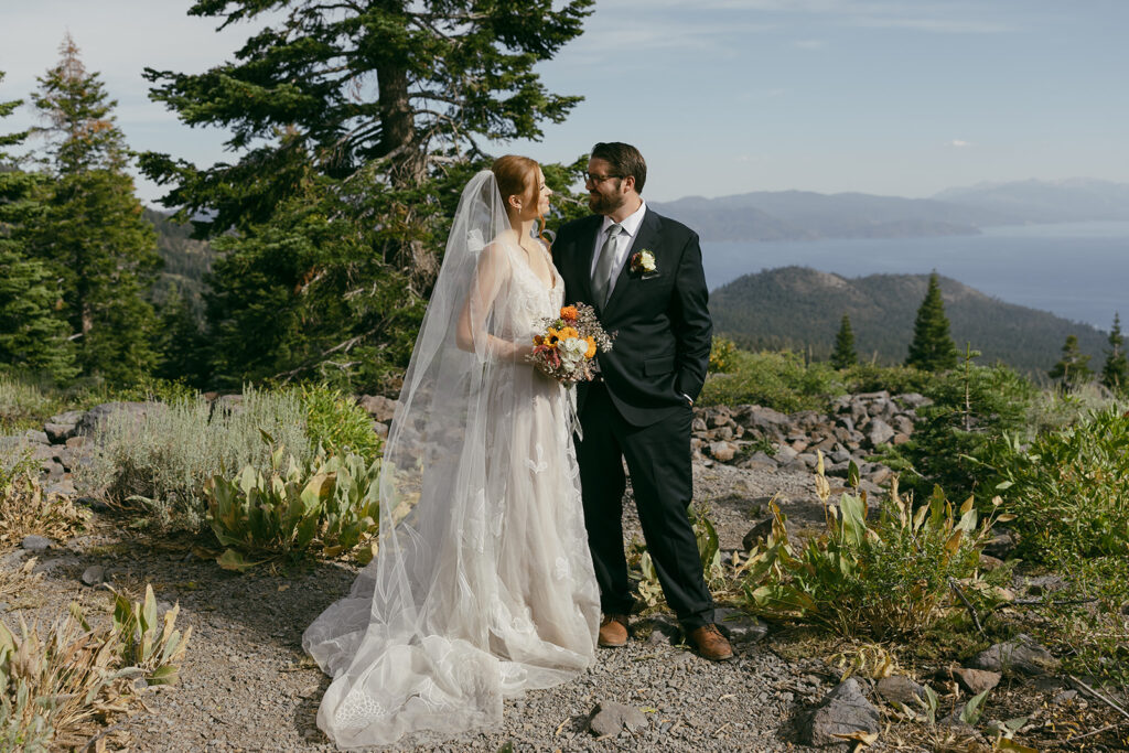 adventure elopement couple on a mountain cliff in lake tahoe
