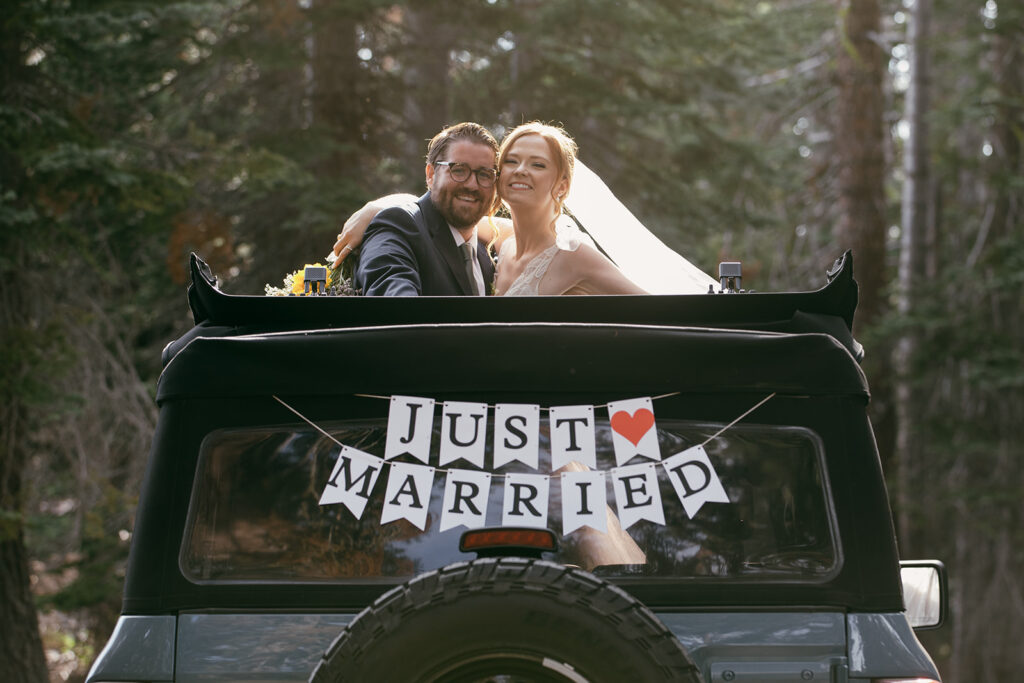 fun adventure elopement couple with their Bronco jeep in Lake Tahoe