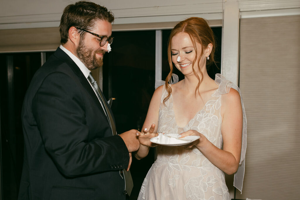 bride and groom cutting elopement cake