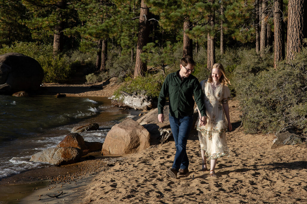 playful, romantic engagement photos at the beach of zephyr cove