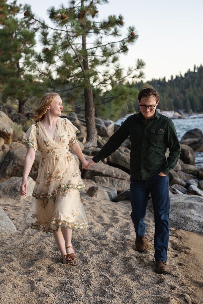 playful, romantic engagement photos at the beach of zephyr cove