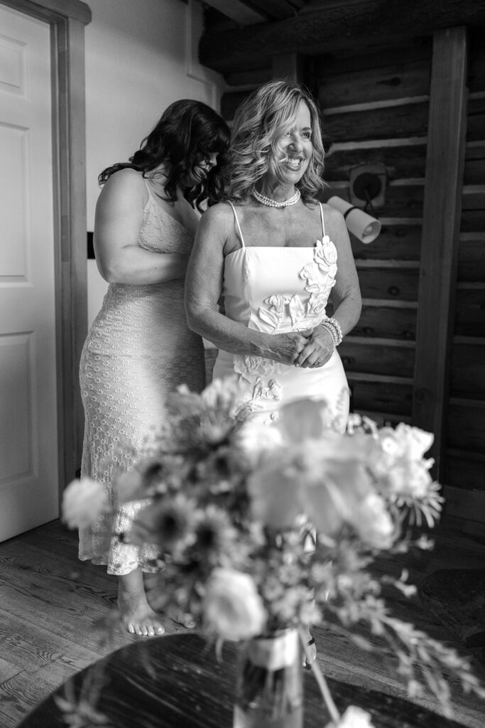 bride getting ready with her daughter at a cabin in desolation hotel
