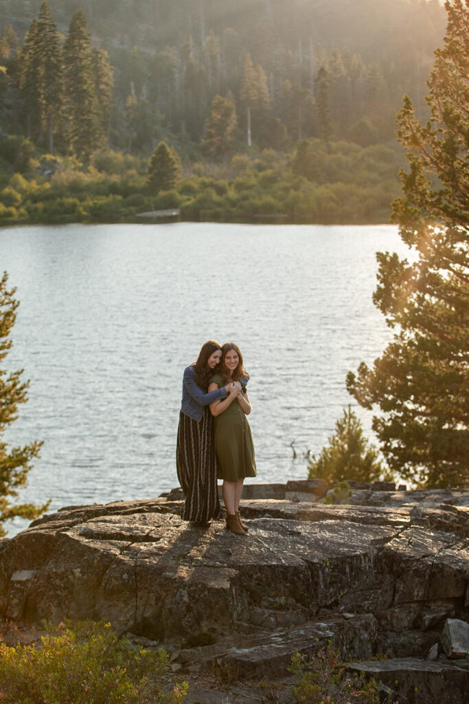 adventurous queer couple surrounded by water views during their Lake Tahoe engagement session