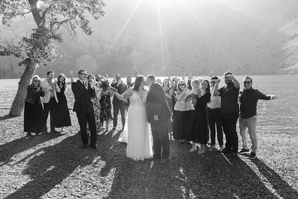 bride and groom posing with their guests during a lake tahoe micro wedding