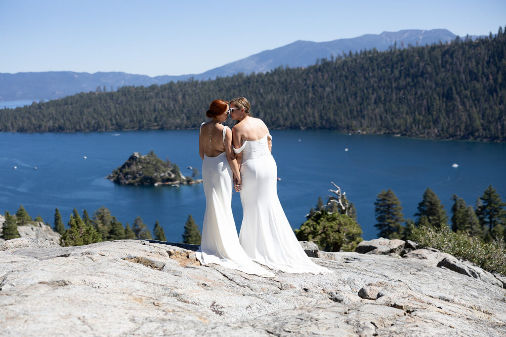 two brides kissing at emerald bay, lake tahoe