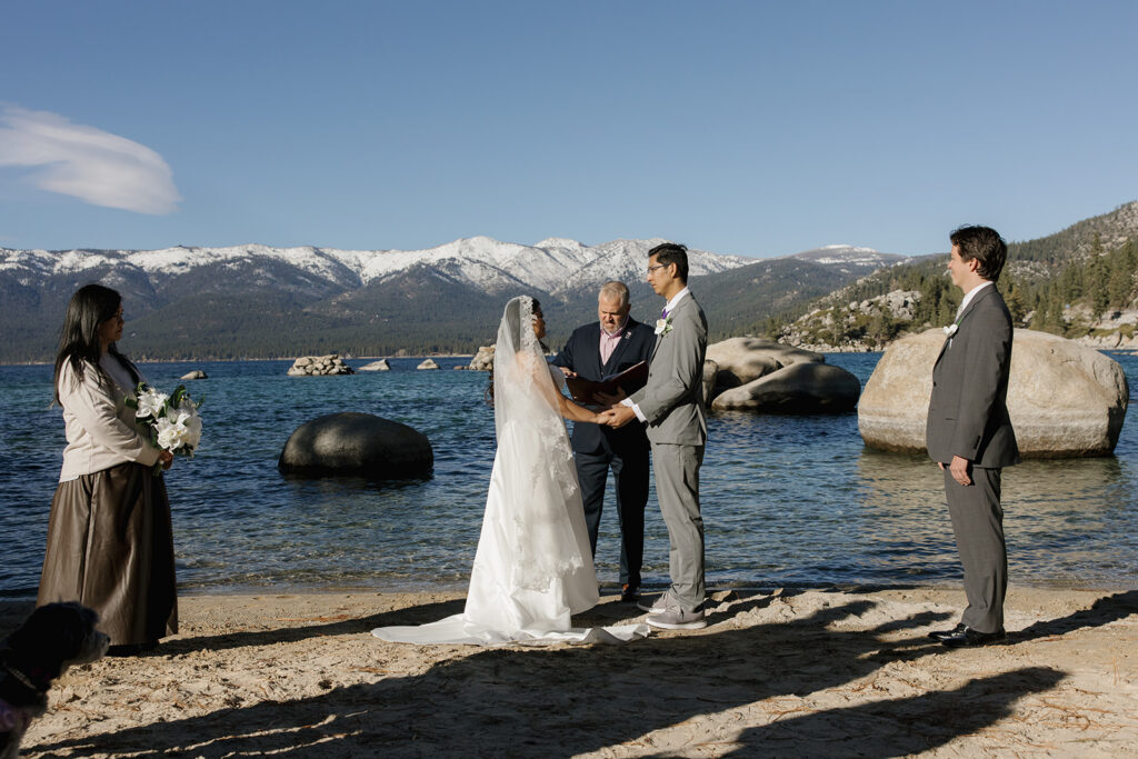 intimate sand harbor micro wedding ceremony in lake tahoe